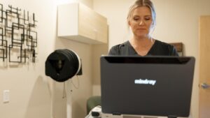 Private exam room with a portable ultrasound system